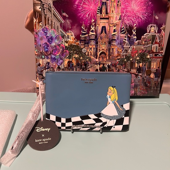 kate spade Handbags - Disney x Kate Spade Alice in Wonderland Large Wristlet
